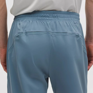 Ensemble de survêtement athlétique moderne pour un style de vie actif, comprenant une veste de performance bleue élégante et un pantalon léger assorti - Product Image 6