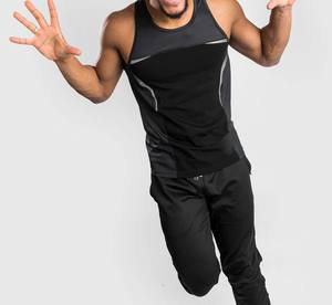 Camiseta sin mangas transpirable de algodón y fibra de bambú con logo personalizado para hombre, ideal para gimnasio, culturismo y deporte, con bloques de color y cuello redondo. - Product Image 5