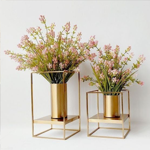 Modern minimalist geometric <b>gold</b> cube stands holding <b>small</b> cylinder <b>table</b> vases, available at wholesale prices. - Product Image 1