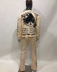 ผู้ผลิตเสื้อผ้าปากีสถานที่ดีที่สุดประจำปี 2025 กางเกงขาบานแบบสั่งทำพิเศษ สไตล์วินเทจฟอกสีแบบแอซิดวอชและซันเฟด ชุดวอร์มผ้าฝ้ายพิมพ์ลายพัฟสำหรับผู้ชาย - Product Image 1