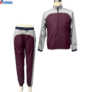 Conjunto Deportivo Personalizado para Hombre, Estilo Jogger, Color Azul Marino y Gris, Bloques de Color, Manga Larga, Cuello Alto, Cortavientos, Unisex - Product Image 2