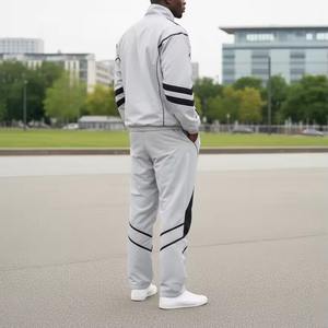 Conjunto de Chaqueta y Pantalones Cortavientos de Nailon Personalizados al por Mayor, Chaqueta Cortavientos con Cierre y Cuello Alto, Traje Deportivo Cortavientos - Product Image 6