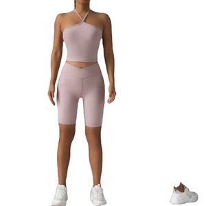 Nouvel ensemble de yoga pour femme avec soutien-gorge dos nu, taille croisée, push-up, vêtements de sport, tenue de course unie avec poches et dos ouvert - Product Image 1