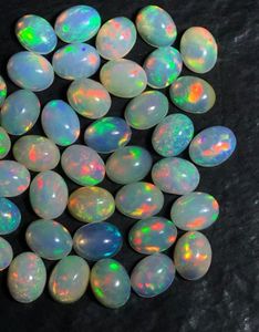 ethopian <b>opal</b> oval shape,natural ethopian <b>opal</b> cabochons.multi fire <b>opal</b> for sell. - Product Image 3