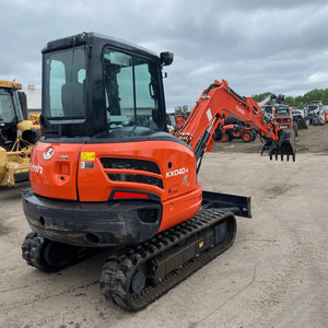 Mini-excavatrice KX018-4 orange sur chenilles en bon état de marche avec godet et lame, moteur 110 kW, garantie 1 an - Product Image 2