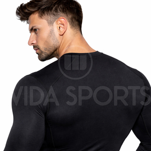 Camiseta Deportiva de Compresión Personalizada OEM, Unisex, Manga Larga, Ropa de Entrenamiento, Transpirable, Elástica en Cuatro Direcciones, para Adolescentes, Estampado Sólido - Product Image 4