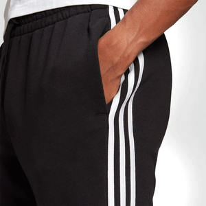 Pantalon de survêtement athlétique slim fit pour homme avec logo personnalisé, côtés rayés, en molleton de polyester et coton, pour la course et l'entraînement, vente en gros - Product Image 4