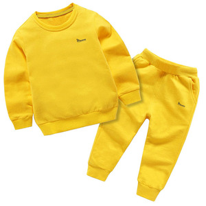 Conjunto Deportivo de Algodón Amarillo de Alta Calidad para Bebés Niños, Cuello Redondo, Manga Larga, Color Sólido, Ropa Casual de Calle con Bolsillos Laterales - Product Image 1