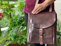 Sac à dos et sac de messager unisexe en cuir de cheval élégant deux en un en cuir dur unique avec fermeture à glissière et doublure en nylon