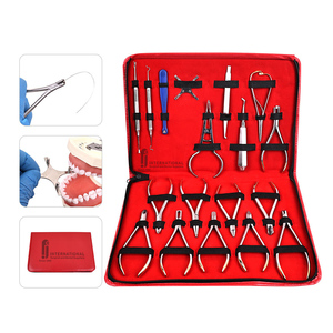Venta al por mayor de fábrica: Kit de herramientas de ortodoncia dental de acero inoxidable de 18 piezas, alicates de ortodoncia dental, alicates de instrumentos quirúrgicos dentales - Product Image 1