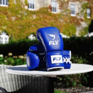 ถุงมือชกมวยสำหรับผู้ใหญ่แบบกำหนดเอง หนัง PU ปิดด้วยแถบตีนตุ๊กแก อุปกรณ์ฝึกซ้อมคุณภาพสูง ทำจากหนังเทียม สีส้ม - Product Image 2