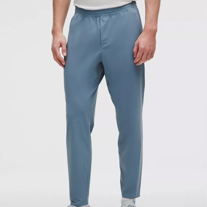 Ensemble de survêtement athlétique moderne pour un style de vie actif, comprenant une veste de performance bleue élégante et un pantalon léger assorti - Product Image 2