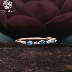Charm_Jewells Rose Gold Eternity <b>Band</b> <b>Ring</b> with Cushion Cut Blue Moissanite Prong Setting Women's Classic Engagement <b>Ring</b> - Product Image 3