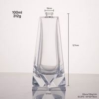 Flacon de parfum rectangulaire en verre minimaliste Prism 60 ml avec base lourde, atomiseur pressurisé, pompe pulvérisatrice sérigraphiée et joint d'étanchéité