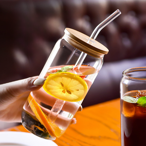 Vente en gros de gobelets en verre transparent à haute teneur en borosilicate de 16oz <span class=keywords><strong>tasse</strong></span> en verre résistant à la chaleur avec couvercle en bambou et pailles - Product Image 3