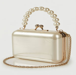 This elegant pearl-handle acrylic box clutch is a timeless <b>bridal</b> choice, available at wholesale prices <b>for</b> your boutique. - Product Image 1