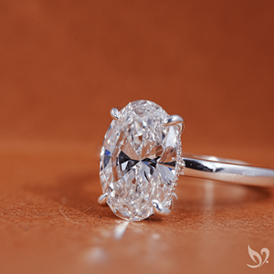 แหวนเพชรทรงรี 3 กะรัต ผลิตในห้องปฏิบัติการ ได้รับการรับรองจาก IGI |   แหวนทองคำแท้ 10k ประดับเพชรเม็ดเดี่ยวทรงกลม พร้อมวงแหวนรอบนอกแบบซ่อน ได้รับการรับรองจาก IGI - Product Image 3