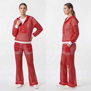 Conjunto de chándal de malla transparente para mujer con sudadera con botones y pantalones acampanados, ideal para discoteca de verano - Product Image 1