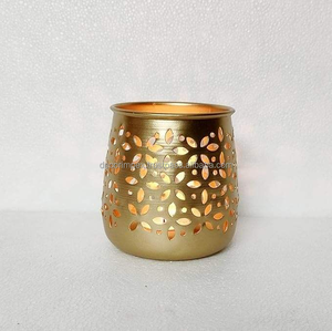 Detailed floral votive holder with <b>laser</b> cutting technology used for creating soft <b>light</b> and serene atmosphere by Decor impex - Product Image 2