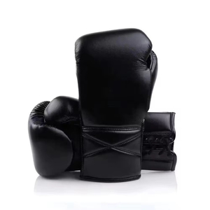 Gants de boxe MMA personnalisés en cuir véritable, ensemble de sparring avec absorption des chocs et design respirant - Légers, unisexes, OEM - Product Image 2