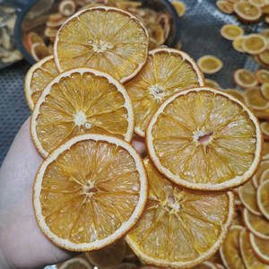 ส้มอบแห้งคุณภาพสูงจากเวียดนาม ไม่เติมน้ำตาล ขนมผลไม้ธรรมชาติ จำหน่ายส่งออกจากโรงงาน - Product Image 1
