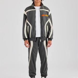 Chaqueta y Pantalones Deportivos de Poliéster y Nailon para Hombre, Diseño Personalizado con Bloques de Color y Parches, Chaqueta con Cierre y Pantalones Deportivos - Product Image 3