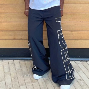 Pantalones Deportivos Rainbow Spray OEM con Logotipo Serigrafiado, Pantalones Cortavientos Personalizados con Cintura Elástica para Hombre, Pantalones Deportivos Anchos de Nylon - Product Image 1
