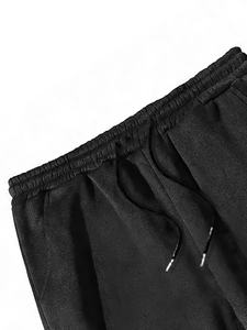 Ensemble survêtement homme noir oversize avec sweat à capuche et pantalon large en molleton de coton – Tenue décontractée premium deux pièces style streetwear - Product Image 5