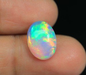 Opale d'Éthiopie (4-6 carats par taille) - Pierre cabochon éclatante aux reflets arc-en-ciel, prix de gros - Product Image 1