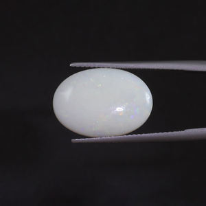 โอปอลธรรมชาติสีขาวรับรองโดย IGI น้ำหนัก 5.35 กะรัต รูปทรงวงรี ขนาด 18x12.5 มม. ตัดด้วยมือ ขัดเงา ผ่านการเคลือบแว็กซ์/น้ำมัน - Product Image 1
