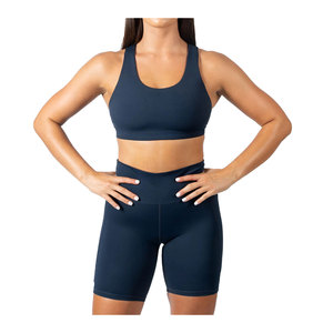 Ensemble de sport décontracté et élégant 2 pièces en coton pour femme – Soutien-gorge de sport couleur unie et short de yoga longueur genou avec boutons décoratifs, finition délavée, durable - Product Image 1