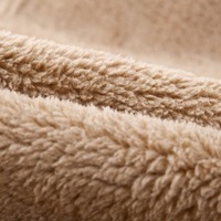 Veste d'hiver en gros, style bomber décontracté pour homme, en cuir bicolore avec empiècements contrastants, doublure polaire épaisse et fermeture éclair frontale, manteau chaud