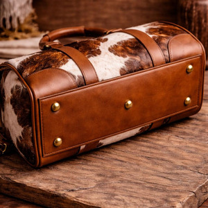 High quality handmade cowhide leather hair travel bags wholesale supplier OEM custom <b>luggage</b> travel duffel bags for sale - Product Image 4