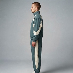 Veste coupe-vent et pantalon de survêtement ample personnalisés avec logo brodé 3D de haute qualité, ensemble de survêtement 100% nylon pour hommes - Product Image 2