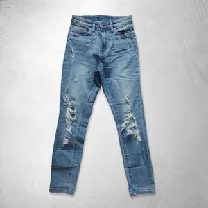 Jeans Rasgados Azul Claro para Hombre, Cintura Alta, Corte Holgado, con Rasgaduras en las Rodillas, Pantalones Vaqueros Casuales de Pierna Recta - Product Image 1