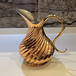 Classic teardrop shaped smooth <b>copper</b> pitcher features an angled pour spout and thin <b>handle</b>, available at wholesale price. - Product Image 3