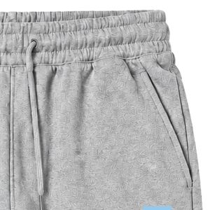Pantalon de jogging gris brodé avec logo JJ, taille à cordon de serrage, poches latérales et chevilles à revers pour un style décontracté et confortable - Product Image 3