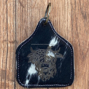 Vente en gros de porte-clés gravés au laser en cuir de vachette avec design personnalisé porte-clés de luxe en cuir véritable cadeaux promotionnels - Product Image 3