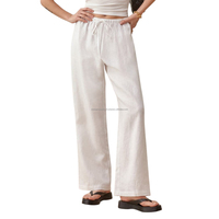 Pantalon à jambes larges en lin blanc pour femme avec boutons Pantalon confortable et élégant