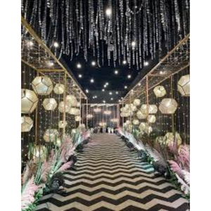 A black and white chevron-patterned aisle <b>runner</b> leading toward a stage - Product Image 1