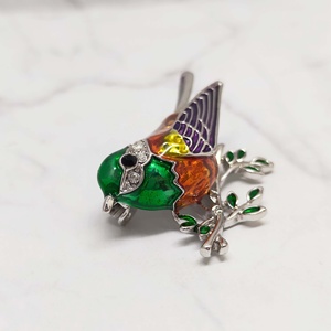 Bird Branch Brooch with Vibrant <b>Hand</b>-Painted Enamel in Emerald and Sunset Tones Elegantly Perched on Silver - Product Image 3