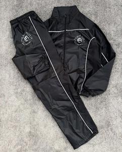 Conjunto Deportivo Personalizado para Hombre, Chaqueta Cortavientos de Spandex/Algodón para Invierno |   Chaqueta y Pantalones Impermeables Ligeros |   Ropa Deportiva al Por Mayor OEM - Product Image 1