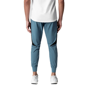 Pantalones de hombre azules con cintura elástica, cordón lateral con rayas, estilo casual, transpirables, de spandex y poliéster, para otoño. - Product Image 3