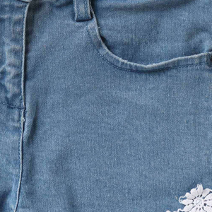 Shorts en jean asymétriques bleu clair pour femmes, tissu respirant, tenue décontractée d'été - Product Image 6