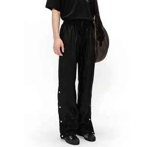 Pantalon homme noir en soie brodé, taille élastique avec cordon de serrage, style chinois, infroissable, poids moyen, pour l'automne - Product Image 2