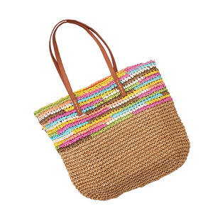 Brighten your summer wardrobe with this chic Natural yarn bag featuring a solid brown body and colorful striped <b>top</b> trim now - Product Image 1