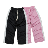 Celana Panjang Pria Model OEM High Star Side Button, Bahan Nylon Ringan Mengkilap, Kaki Lebar, Warna Hitam, Model Flare