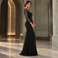 Robe de sirène noire à perles géométriques avec manches longues transparentes et décolleté en V |   Robe de soirée longue pour les occasions formelles