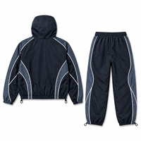 Ensemble de survêtement réfléchissant colorblock inspiré de la course automobile, personnalisé par le fabricant - Veste à capuche et pantalon ample, ensemble streetwear 2 pièces