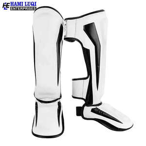 Venta al por mayor de espinilleras de cuero para entrenamiento de sparring kick boxing muay thai logotipo personalizado adulto fitness pierna espinilleras protección de piernas - Product Image 4